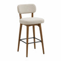 Taburete de tela beige con estructura de madera y metal